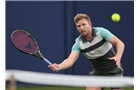 EASTBOURNE, ENGLAND - JUNE 14: Daniel Cox of Great Britain plays a forehand against Rhett Purcell of Great Britain during their Men's Singles qualifying match on day one of the Aegon International at Devonshire Park on June 14, 2014 in Eastbourne, England.  (Photo by Steve Bardens/Getty Images)
